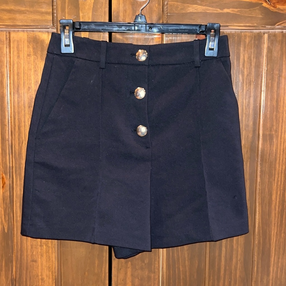 Black with gold buttons, high rise shorts!